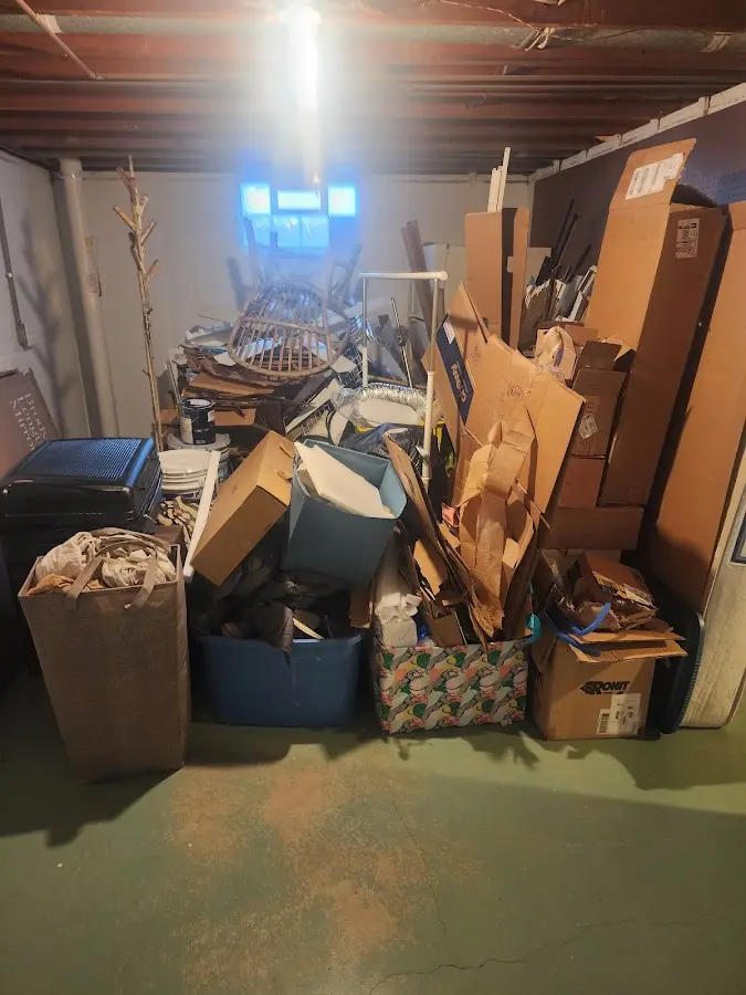 Roll-off dumpster container at job site for 2 Yard Dumpster Rental in Ramona